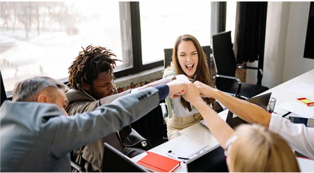 The Dynamic Duo: How Self-Awareness and Emotional Intelligence Shape Our Lives 2 Diverse Team Huddling around connecting arms